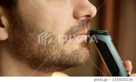 Precise mustache trimming using electric shaver Precise mustache trimming using electric shaver 133820216