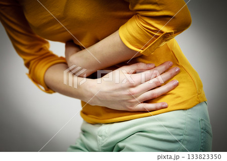 Woman suffer from belly pain. Woman suffer from belly pain. 133823350