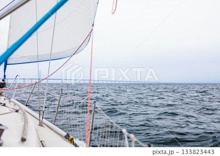 Yacht and oresund bridge between denmark sweden 133823443