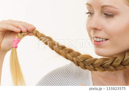 Blonde girl with braid hair Blonde girl with braid hair 133823575