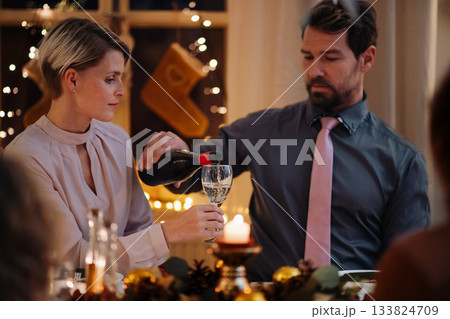 Christmas toast with white wine. 133824709