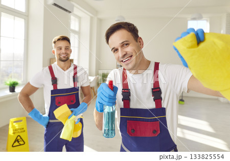 Portrait of Uniformed Men Cleaners at Home Or Office Portrait of Uniformed Men Cleaners at Home Or Office 133825554