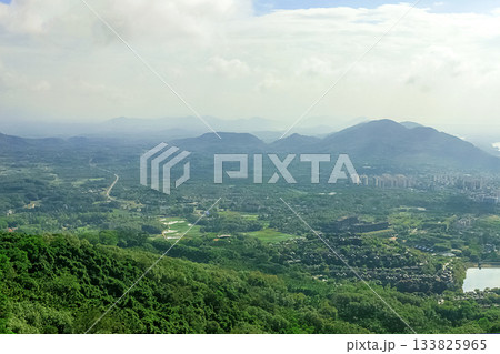 View of the beautiful jungle depths of Yanoda Park on Hainan Island, China. 133825965