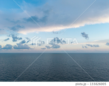 Sunset sea and seascape. Sea horizon view. Cloudy sky and seascape at summer vacation. Skyscape sea horizon. Calm horizon with sea nature. Romantic summer vacation at seascape. Horizon at sunrise Sunset sea and seascape. Sea horizon view. Cloudy sky and seascape at summer vacation. Skyscape sea horizon. Calm horizon with sea nature. Romantic summer vacation at seascape. Horizon at sunrise 133826005