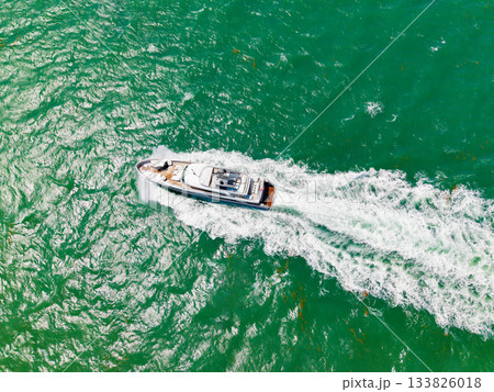 Luxury boat yachting. Motorboat sailing at sea. Luxury private yacht in sea. Motor yacht luxury vessel. Boat motor aerial. Vacation on summer. Aerial view motorboat. Yacht boat tour. Yacht getaway 133826018