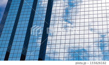 Glass exterior background. Architecture. Building exterior architecture. Building background. Glass backdrop building. Architectural detail. Background of architecture. Modern glass background Glass exterior background. Architecture. Building exterior architecture. Building background. Glass backdrop building. Architectural detail. Background of architecture. Modern glass background 133826182