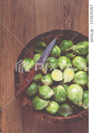 fresh Brussels sprouts, raw, top view, on a wooden table, no people, 133826367