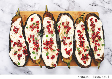 fried eggplant with sauce, decorated with microgreens and pomegranate seeds, eggplant appetizer, top view, homemade, no people, fried eggplant with sauce, decorated with microgreens and pomegranate seeds, eggplant appetizer, top view, homemade, no people, 133826401