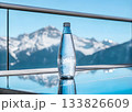 Bottle of mineral water with mountains background. 133826609