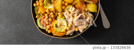 This balanced breakfast showcases baked sweet potato with carrots and zucchini, flavorful carrot and lentil cutlets, chicken breast, banner 133826636