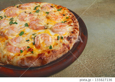 four cheese pizza with shrimp and fresh microgreens, served on a wooden board, homemade, no people, 133827136