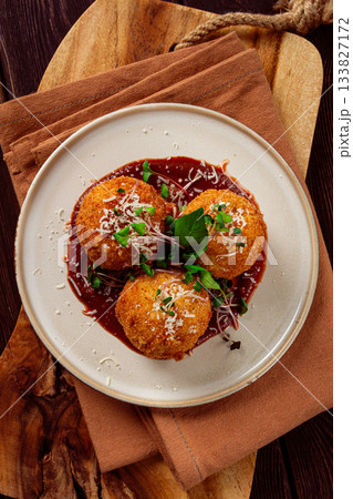 Crispy Arancini appetizer, with parmesan cheese and microgreens, plate, tomato sauce, homemade, no people, 133827172