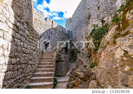 The Cathar medieval castle of Peyrepertuse in the Aude department, southern France situated in the French Pyrenees 133828036