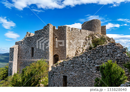 The Cathar medieval castle of Peyrepertuse in the Aude department, southern France situated in the French Pyrenees The Cathar medieval castle of Peyrepertuse in the Aude department, southern France situated in the French Pyrenees 133828040