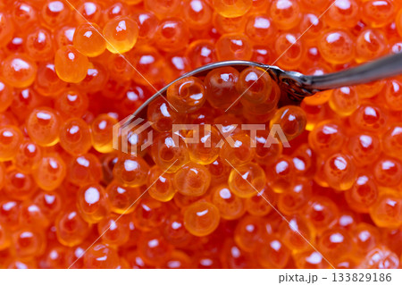 Delicious red caviar, closeup. Delicious red caviar, closeup. 133829186