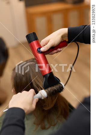 refined styling with professional tools, achieving perfect hair shape through expert techniques and tools refined styling with professional tools, achieving perfect hair shape through expert techniques and tools 133829978