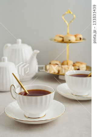 English Afternoon Tea  in elegant white porcelain cups 133833439