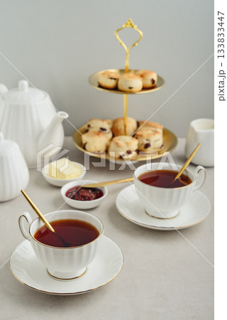 English Afternoon Tea  in elegant white porcelain cups 133833447