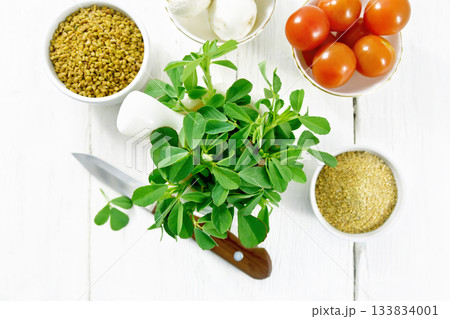 Fenugreek green in mortar on board top Fenugreek green in mortar on board top 133834001