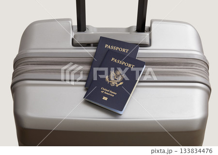US passports on gray suitcase US passports on gray suitcase 133834476