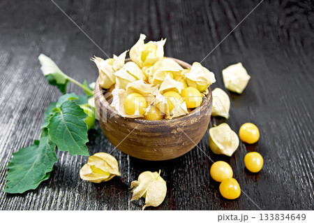 Physalis in bowl on board 133834649