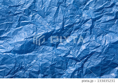 Close-up of wrinkled blue paper Close-up of wrinkled blue paper 133835231