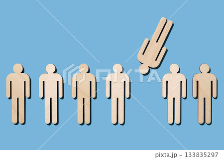Wooden cutouts of people on blue background Wooden cutouts of people on blue background 133835297