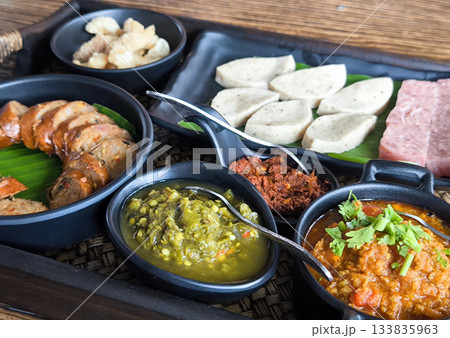 Northern Thai Appetizers traditional on a Wicker Tray Northern Thai Appetizers traditional on a Wicker Tray 133835963