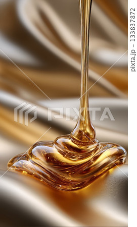 Golden honey drizzling smoothly across glossy surface, forming elegant, intricate swirls with luxurious, silky movement and refined visual depth 133837872
