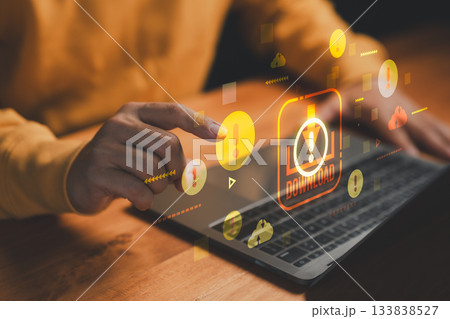 Cybersecurity risk and malware download warning concept with alert icons on laptop, symbolizing online threats, computer virus, unsafe files, hacking, phishing, and internet security. 133838527