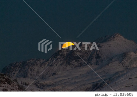 Midwinter moon over Bodo 133839609