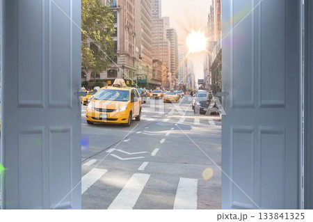 City street seen from open door 133841325