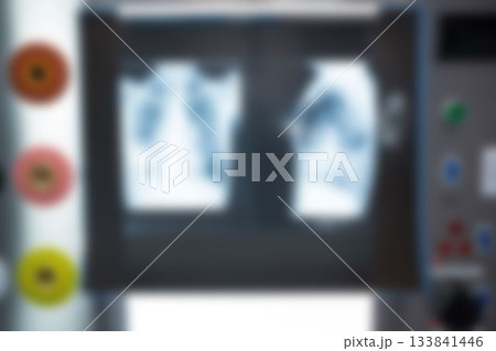Blurry view of x-ray report in hospital 133841446