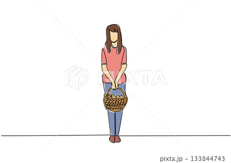 Single continuous line drawing a woman carrying a rattan basket filled with mushrooms with both hands. Hunt until get a large amount. National Mushroom Hunting Day. One line design vector illustration 133844743