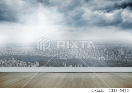 Flat design is showing light-wood floor and white wall via glass window revealing skyline and park Flat design is showing light-wood floor and white wall via glass window revealing skyline and park 133845420
