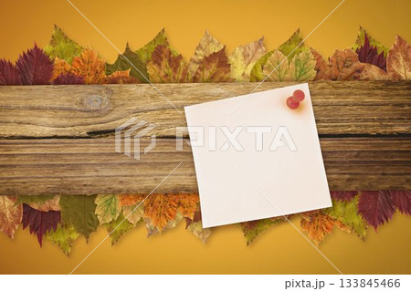 Autumn leaves with yellow note 133845466