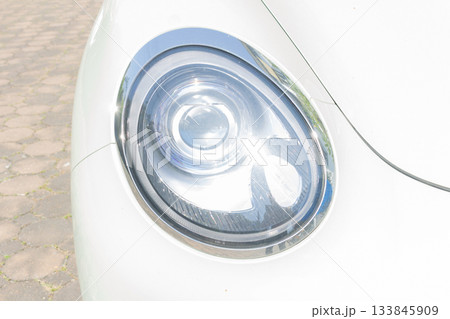 car headlights isolated on white background 133845909