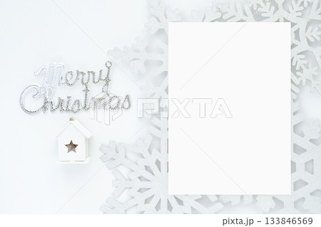 Merry Christmas card mockup on snowflake background 133846569