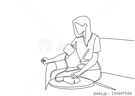 Continuous one line drawing a woman in casual clothes sitting on a sofa and measuring her blood pressure. Health conscious. Check. World Hypertension Day. Single line draw design vector illustration 133847588