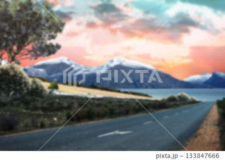 Highway towards sea during sunset 133847666