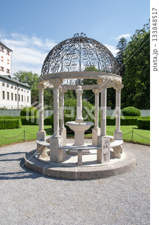 Stone Pavilion with Ornate Iron Dome in the Gardens of Ambras Castle Innsbruck Austria 133848517