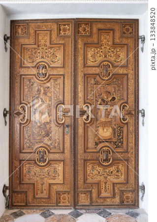 Ornate Carved Wooden Doors with Renaissance Motifs at Ambras Castle Innsbruck Austria 133848520