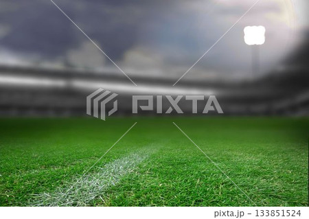 Flat design grass pitch is covering stadium front with white sideline, stands and floodlight tower 133851524