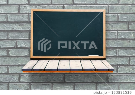 Black board on a wooden shelf 133851539