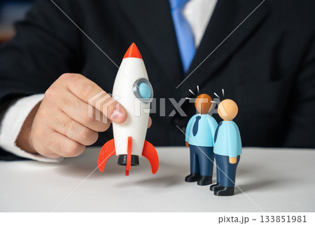 A businessman presents a rocket to investors. An invitation to candidates to board the project. Startup launch, innovation pitching and rapid business growth. Investment and entrepreneurship 133851981