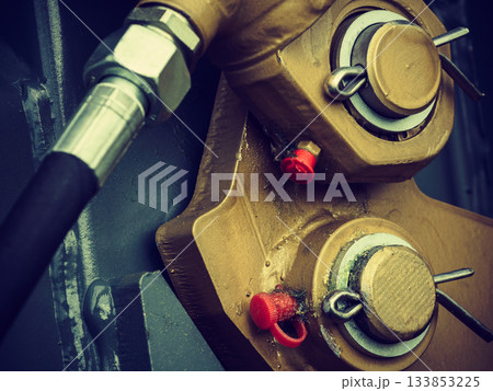 Detailed closeup of screw and bolts 133853225