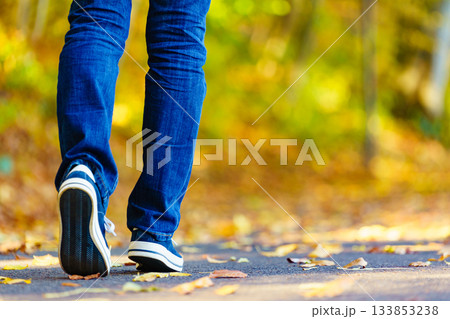 Person wearing casual sneakers outdoor 133853238