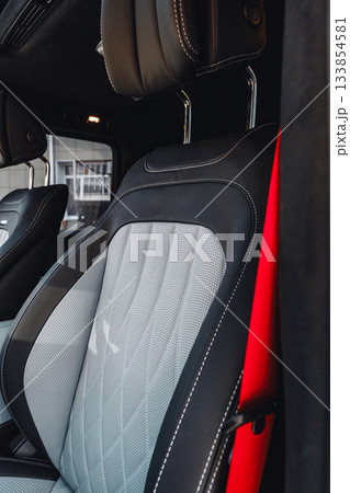 Modern car interior with stylish seat design and high-quality materials Modern car interior with stylish seat design and high-quality materials 133854581