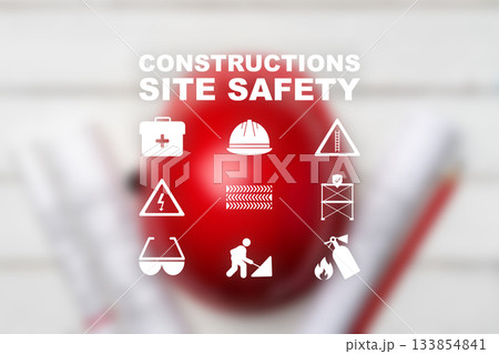 Construction site safety symbols displayed on a red background for workers' awareness 133854841