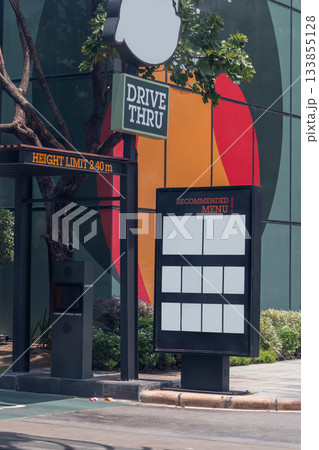 Drive thru sign in fast food restaurant. Drive thru sign into the shop. 133855128